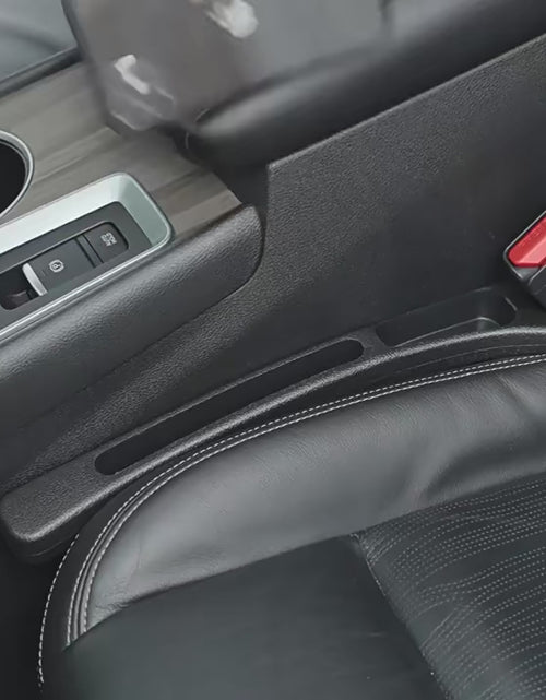 Load and play video in Gallery viewer, Car Seat Gap Filler Side Seam Plug Strip Leak-Proof Filling Strip for All Car Model Wallet Phone Holder Car Accessories
